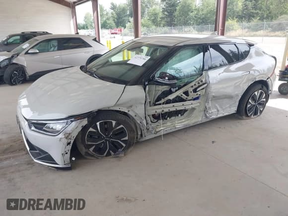 ✅ 2024 Kia EV6 Wind • VIN: KNDC34LA9R5179963 • Lot: 42779706. Listed on IAAI with 7,885 mi. Free auction sales archive from the USA and detailed vehicle history report at DreamBid. Image 2.