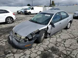 1996 Saturn SL with VIN 1G8ZH5288TZ156412, listed as a Copart auction lot 44429465 with 141,560 mi miles and Salvage title. Bid and sale history available at DreamBid. Image 1.