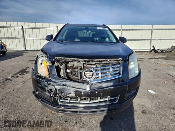 ✅ 2014 Cadillac SRX • VIN: 3GYFNAE31ES679002 • Лот: 86743655. Опубликован ранее на Copart с пробегом 159 668 миль. Бесплатный доступ к архиву аукционных продаж из США и подробный отчёт об истории автомобиля на DreamBid. Изображение 5.