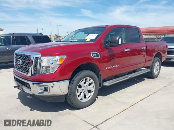 ✅ 2017 Nissan Titan SV • VIN: 1N6AA1F27HN552395 • Lot: 42825236. Listed on IAAI with 50,903 mi. Free auction sales archive from the USA and detailed vehicle history report at DreamBid. Image 2.