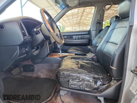 ✅ 2002 Infiniti QX4 Luxury • VIN: JNRDR09Y42W258392 • Lot: 64938145. Listed on Copart with Not provided. Free auction sales archive from the USA and detailed vehicle history report at DreamBid. Image 7.