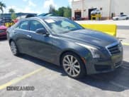 ✅ 2014 Cadillac ATS Luxury RWD • VIN: 1G6AB5RAXE0142079 • Lot: 42517963. Listed on IAAI with 140,118 mi. Free auction sales archive from the USA and detailed vehicle history report at DreamBid. Image 1.
