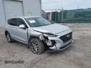 ✅ 2020 Hyundai Santa Fe SE • VIN: 5NMS2CAD3LH147634 • Lot: 42157709. Listed on IAAI with 69,496 mi. Free auction sales archive from the USA and detailed vehicle history report at DreamBid. Image 6.