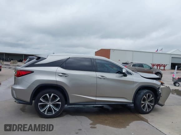 ✅ 2017 Lexus RX 350 • VIN: 2T2ZZMCA0HC036714 • Lot: 42723644. Listed on IAAI with 98,013 mi. Free auction sales archive from the USA and detailed vehicle history report at DreamBid. Image 14.