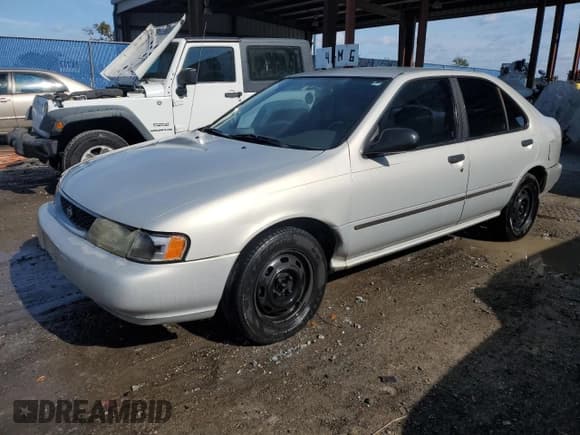 ✅ 1998 Nissan Sentra XE • VIN: 1N4AB41D9WC711992 • Lot: 84514354. Listed on Copart with 90,840 mi. Free auction sales archive from the USA and detailed vehicle history report at DreamBid. Image 1.