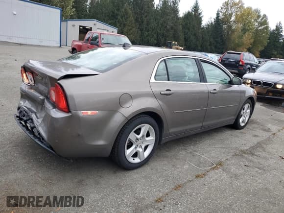 ✅ 2012 Chevrolet Malibu 1LS • VIN: 1G1ZB5E09CF150285 • Lot: 86843625. Listed on Copart with 129,115 mi. Free auction sales archive from the USA and detailed vehicle history report at DreamBid. Image 3.