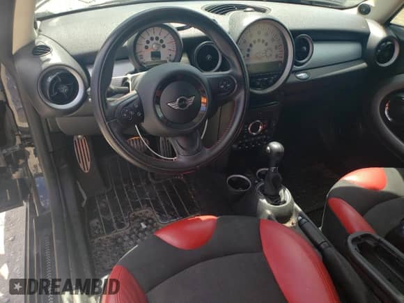 2011 MINI Hardtop S with VIN WMWSV3C53BTY15603, listed as a Copart auction lot 54893395 with 104,206 mi miles and Salvage title. Bid and sale history available at DreamBid. Image 8.