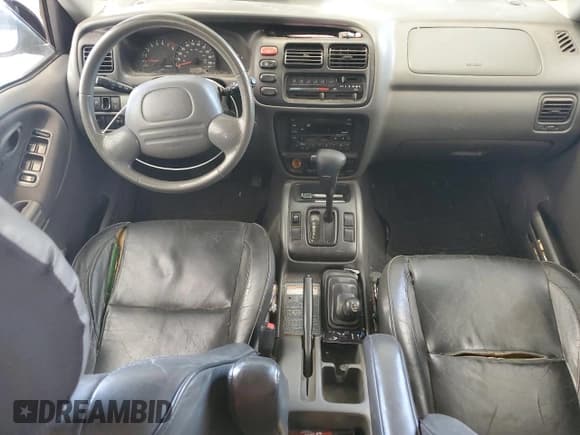 ✅ 2001 Suzuki Grand Vitara JLX • VIN: JS3TD62V414155806 • Lot: 62867875. Wystawiony na Copart z przebiegiem 173 333 mil. Bezpłatny archiwum sprzedaży aukcyjnych z USA i szczegółowy raport historii pojazdu na DreamBid. Zdjęcie 8.