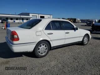 ✅ 1996 Mercedes-Benz C • VIN: WDBHA28E8TF389546 • Лот: 86340144. Опубликован ранее на Copart с пробегом 314 364 миль. Бесплатный доступ к архиву аукционных продаж из США и подробный отчёт об истории автомобиля на DreamBid. Изображение 3.