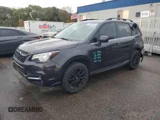 2018 Subaru Forester Limited with VIN JF2SJARCXJH519716, listed as a Copart auction lot 82580805 with 137,336 mi miles and Salvage title. Bid and sale history available at DreamBid. Image 1.
