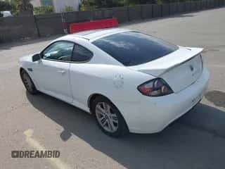 ✅ 2007 Hyundai Tiburon GS • VIN: KMHHM66D47U254751 • Лот: 43124714. Опубликован ранее на IAAI с пробегом 206 292 миль. Бесплатный доступ к архиву аукционных продаж из США и подробный отчёт об истории автомобиля на DreamBid. Изображение 3.