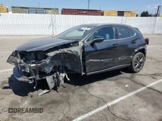 ✅ 2022 Lexus UX 250h F Sport • VIN: JTHE9JBH2N2056763 • Lot: 70052364. Listed on Copart with 50,802 mi. Free auction sales archive from the USA and detailed vehicle history report at DreamBid. Image 1.