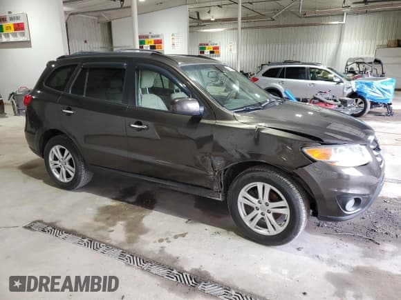 ✅ 2011 Hyundai Santa Fe Limited • VIN: 5XYZKDAG3BG084994 • Lot: 84524164. Listed on Copart with 238,391 mi. Free auction sales archive from the USA and detailed vehicle history report at DreamBid. Image 4.