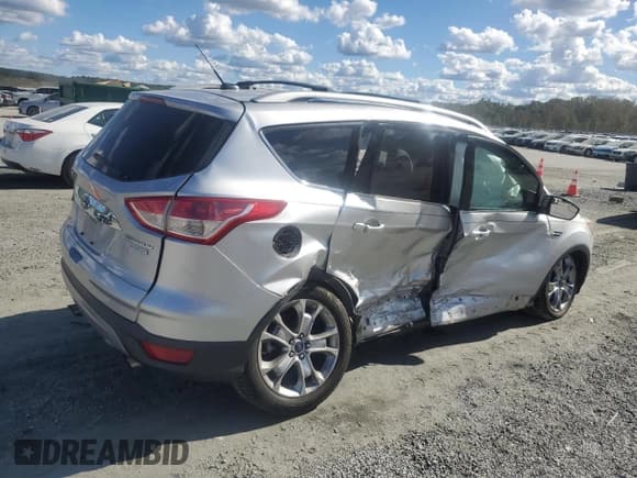 ✅ 2014 Ford Escape Titanium • VIN: 1FMCU0J98EUD24758 • Лот: 86516345. Опубликован ранее на Copart с пробегом 132 126 миль. Бесплатный доступ к архиву аукционных продаж из США и подробный отчёт об истории автомобиля на DreamBid. Изображение 3.