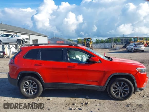 ✅ 2021 Jeep Cherokee 80th Anniversary • VIN: 1C4PJMMXXMD158435 • Lot: 43060196. Listed on IAAI with 89,043 mi. Free auction sales archive from the USA and detailed vehicle history report at DreamBid. Image 12.