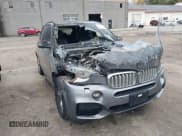 ✅ 2015 BMW X5 xDrive50i • VIN: 5UXKR6C50F0J76918 • Lot: 43696994. Listed on IAAI with 141,000 mi. Free auction sales archive from the USA and detailed vehicle history report at DreamBid. Image 1.