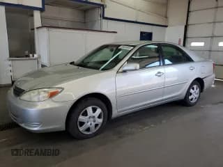 ✅ 2004 Toyota Camry LE • VIN: JTDBE32K640250990 • Lot: 80534935. Listed on Copart with 182,398 mi. Free auction sales archive from the USA and detailed vehicle history report at DreamBid. Image 1.