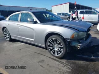 ✅ 2013 Dodge Charger SE • VIN: 2C3CDXBG1DH660333 • Lot: 43417540. Listed on IAAI with 227,145 mi. Free auction sales archive from the USA and detailed vehicle history report at DreamBid. Image 1.