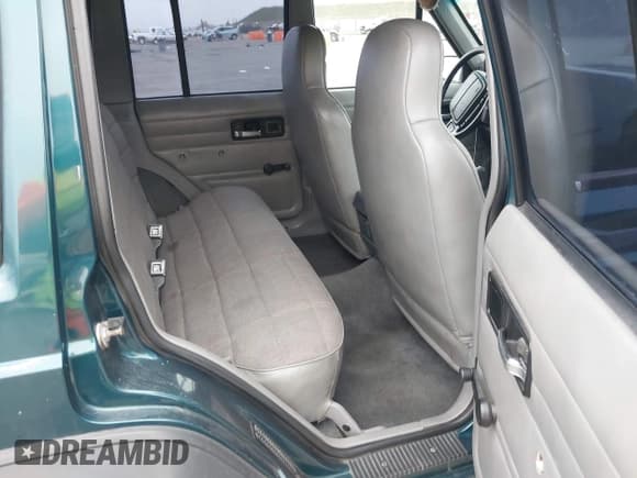 ✅ 1995 Jeep Cherokee SE • VIN: 1J4FJ28S9SL657965 • Lot: 43840644. Listed on IAAI with 270,929 mi. Free auction sales archive from the USA and detailed vehicle history report at DreamBid. Image 8.