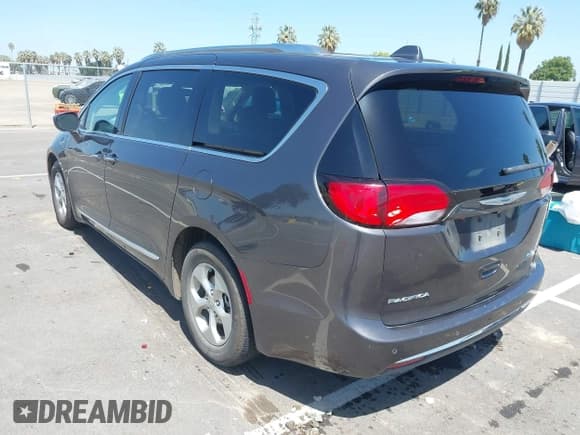 ✅ 2018 Chrysler Pacifica Hybrid Touring L • VIN: 2C4RC1L71JR129532 • Lot: 42064129. Listed on IAAI with 129,665 mi. Free auction sales archive from the USA and detailed vehicle history report at DreamBid. Image 3.