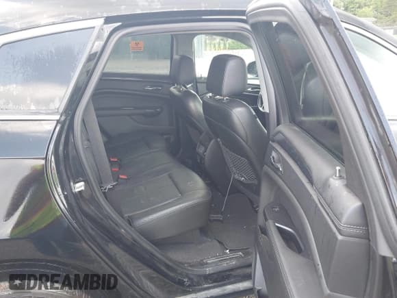 ✅ 2016 Cadillac SRX • VIN: 3GYFNAE35GS531664 • Lot: 42557613. Wystawiony na IAAI z przebiegiem 69 917 mil. Bezpłatny archiwum sprzedaży aukcyjnych z USA i szczegółowy raport historii pojazdu na DreamBid. Zdjęcie 8.