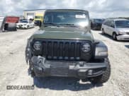 ✅ 2022 Jeep Wrangler Sport S • VIN: 1C4GJXAN7NW216074 • Lot: 64981795. Wystawiony na Copart z przebiegiem 29 394 mil. Bezpłatny archiwum sprzedaży aukcyjnych z USA i szczegółowy raport historii pojazdu na DreamBid. Zdjęcie 5.