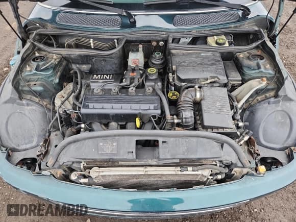 ✅ 2005 MINI Hardtop • VIN: WMWRC33415TJ66089 • Lot: 61674255. Listed on Copart with 162,183 mi. Free auction sales archive from the USA and detailed vehicle history report at DreamBid. Image 11.