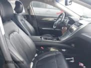 ✅ 2016 Lincoln MKZ • VIN: 3LN6L2J93GR607607 • Lot: 42810370. Listed on IAAI with 131,030 mi. Free auction sales archive from the USA and detailed vehicle history report at DreamBid. Image 5.