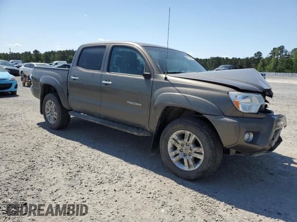 ✅ 2015 Toyota Tacoma • VIN: 3TMLU4EN3FM200857 • Lot: 53662445. Listed on Copart with 99,782 mi. Free auction sales archive from the USA and detailed vehicle history report at DreamBid. Image 4.