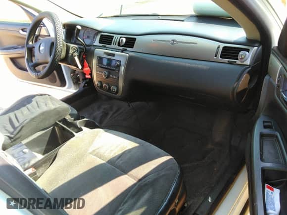 2013 Chevrolet Impala Police with VIN 2G1WD5E38D1119903, listed as a IAAI auction lot 31084153 with 92,562 mi miles and . Bid and sale history available at DreamBid. Image 5.