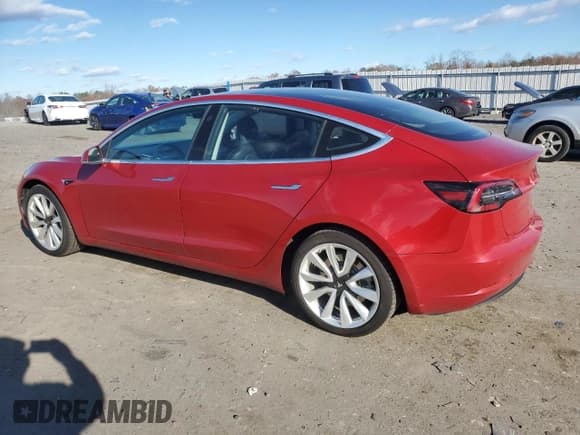 ✅ 2018 Tesla Model 3 Long Range Battery • VIN: 5YJ3E1EB6JF146131 • Lot: 92086685. Listed on Copart with 122,145 mi. Free auction sales archive from the USA and detailed vehicle history report at DreamBid. Image 2.