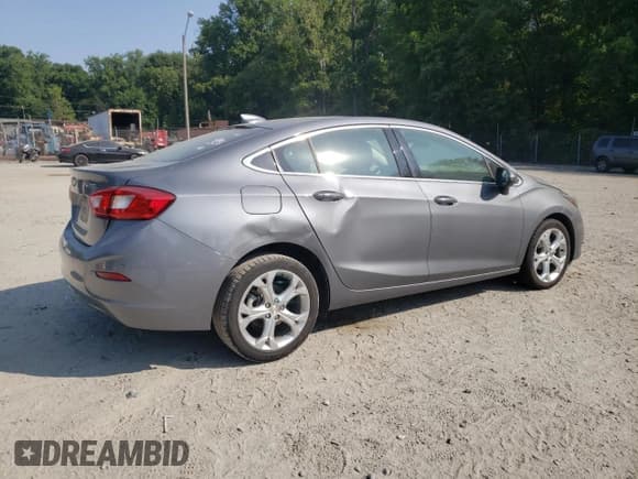 ✅ 2018 Chevrolet Cruze Premier • VIN: 1G1BF5SM8J7232710 • Lot: 54701113. Listed on Copart with 74,764 mi. Free auction sales archive from the USA and detailed vehicle history report at DreamBid. Image 3.