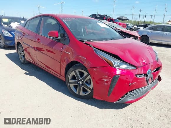 ✅ 2021 Toyota Prius LE • VIN: JTDKAMFU0M3142456 • Lot: 43447432. Wystawiony na IAAI z przebiegiem 32 473 mil. Bezpłatny archiwum sprzedaży aukcyjnych z USA i szczegółowy raport historii pojazdu na DreamBid. Zdjęcie 1.