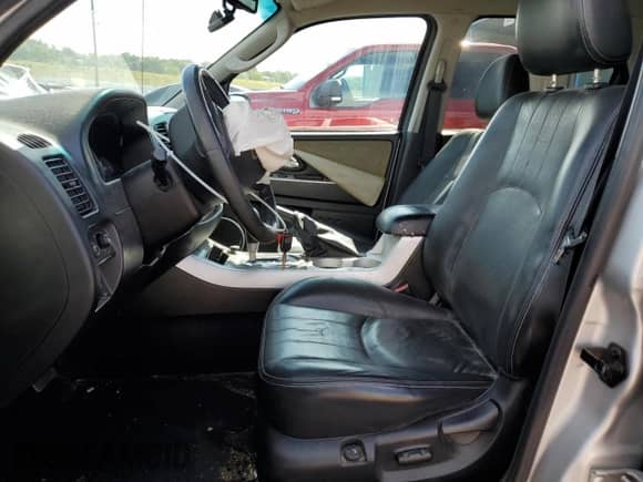 2007 Mercury Mariner Premier с VIN 4M2CU97137KJ04575, выставлен на аукционе Copart как лот 70735655 с пробегом 91 350 миль миль и Списание • Salvage title. История ставок и продаж доступна на DreamBid. Изображение 7.