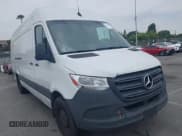✅ 2022 Mercedes-Benz Sprinter Cargo • VIN: W1Y4EDHY7NT091581 • Lot: 42478500. Listed on IAAI with 67,897 mi. Free auction sales archive from the USA and detailed vehicle history report at DreamBid. Image 1.