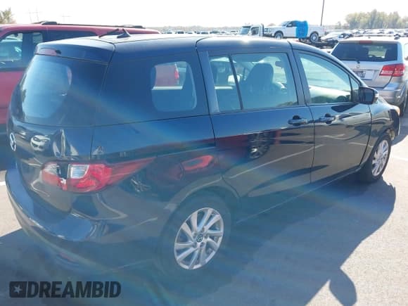 ✅ 2014 Mazda 5 Sport • VIN: JM1CW2BL3E0176689 • Lot: 43653289. Listed on IAAI with 218,041 mi. Free auction sales archive from the USA and detailed vehicle history report at DreamBid. Image 4.
