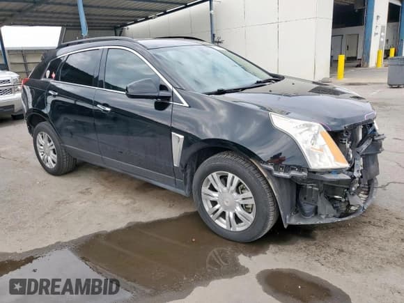 ✅ 2015 Cadillac SRX • VIN: 3GYFNAE37FS509115 • Лот: 85842335. Опубликован ранее на Copart с пробегом 83 192 миль. Бесплатный доступ к архиву аукционных продаж из США и подробный отчёт об истории автомобиля на DreamBid. Изображение 4.