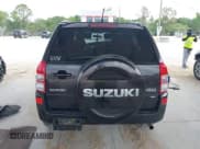 ✅ 2013 Suzuki Grand Vitara Limited • VIN: JS3TD0D75D4100331 • Lot: 42146459. Listed on IAAI with 133,359 mi. Free auction sales archive from the USA and detailed vehicle history report at DreamBid. Image 16.