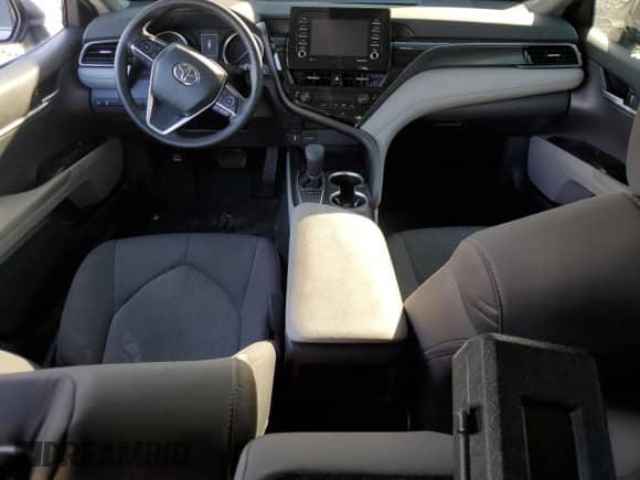 2023 Toyota Camry LE with VIN 4T1C11AK1PU121943, listed as a Copart auction lot 82264925 with 56,723 mi miles and Salvage title. Bid and sale history available at DreamBid. Image 8.