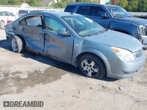 ✅ 2009 Saturn Aura XE • VIN: 1G8ZS57BX9F168416 • Lot: 43562826. Listed on IAAI with 144,846 mi. Free auction sales archive from the USA and detailed vehicle history report at DreamBid. Image 1.