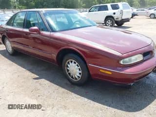 ✅ 1998 Oldsmobile 88 LS • VIN: 1G3HN52K7W4845557 • Lot: 42538877. Listed on IAAI with 197,906 mi. Free auction sales archive from the USA and detailed vehicle history report at DreamBid. Image 1.