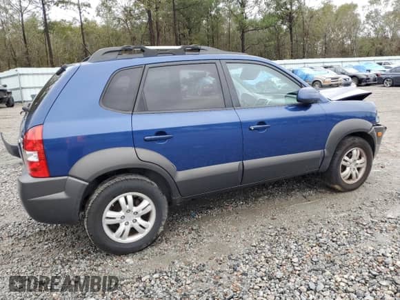 2007 Hyundai Tucson SE with VIN KM8JN12D37U590110, listed as a Copart auction lot 80639874 with 99,369 mi miles and Salvage title. Bid and sale history available at DreamBid. Image 3.