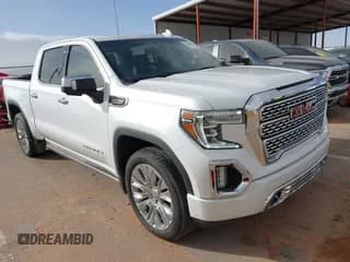 ✅ 2022 GMC Sierra 1500 Denali • VIN: 3GTU9FEL1NG173980 • Лот: 41569082. Опубликован ранее на IAAI с пробегом 26 880 миль. Бесплатный доступ к архиву аукционных продаж из США и подробный отчёт об истории автомобиля на DreamBid. Изображение 1.