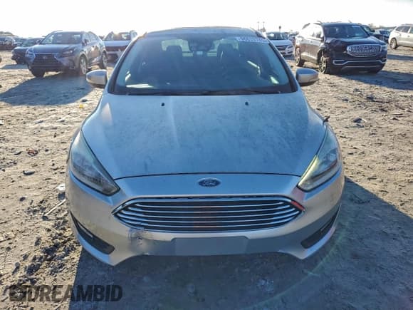 ✅ 2017 Ford Focus Titanium • VIN: 1FADP3J26HL241852 • Lot: 96039745. Listed on Copart with 59,090 mi. Free auction sales archive from the USA and detailed vehicle history report at DreamBid. Image 5.