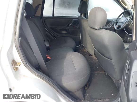 ✅ 2004 Jeep Grand Cherokee Laredo • VIN: 1J4GW48S74C307819 • Lot: 43829310. Listed on IAAI with Not provided. Free auction sales archive from the USA and detailed vehicle history report at DreamBid. Image 8.