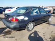 ✅ 1999 Toyota Corolla CE • VIN: 1NXBR12EXXZ252527 • Lot: 43668301. Listed on IAAI with 134,473 mi. Free auction sales archive from the USA and detailed vehicle history report at DreamBid. Image 4.