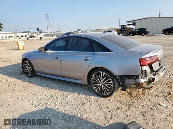 ✅ 2016 Audi A6 Prestige • VIN: WAUHGAFCXGN060769 • Лот: 81151315. Опубликован ранее на Copart с пробегом 120 790 миль. Бесплатный доступ к архиву аукционных продаж из США и подробный отчёт об истории автомобиля на DreamBid. Изображение 2.