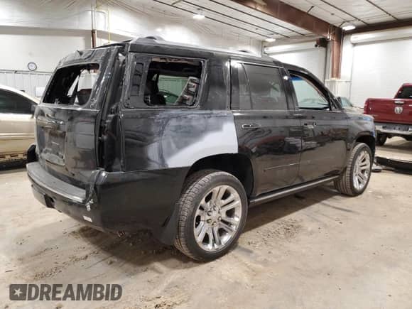 2020 Chevrolet Tahoe Premier with VIN 1GNSKCKJ7LR104163, listed as a Copart auction lot 49161335 with 66,135 mi miles and Salvage title. Bid and sale history available at DreamBid. Image 3.
