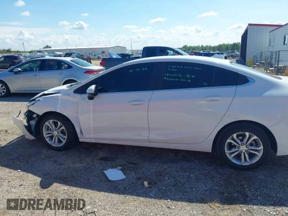 2019 Chevrolet Cruze LT with VIN 1G1BE5SM2K7115242, listed as a IAAI auction lot 43305485 with 77,219 mi miles and . Bid and sale history available at DreamBid. Image 14.