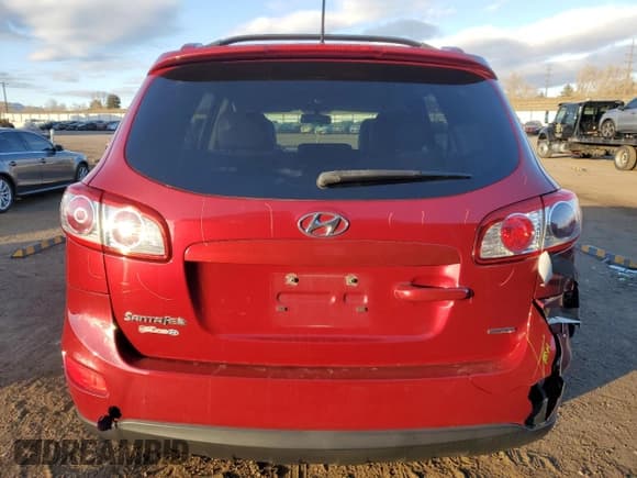 ✅ 2012 Hyundai Santa Fe Limited • VIN: 5XYZHDAG5CG104954 • Lot: 86885474. Listed on Copart with 109,654 mi. Free auction sales archive from the USA and detailed vehicle history report at DreamBid. Image 6.